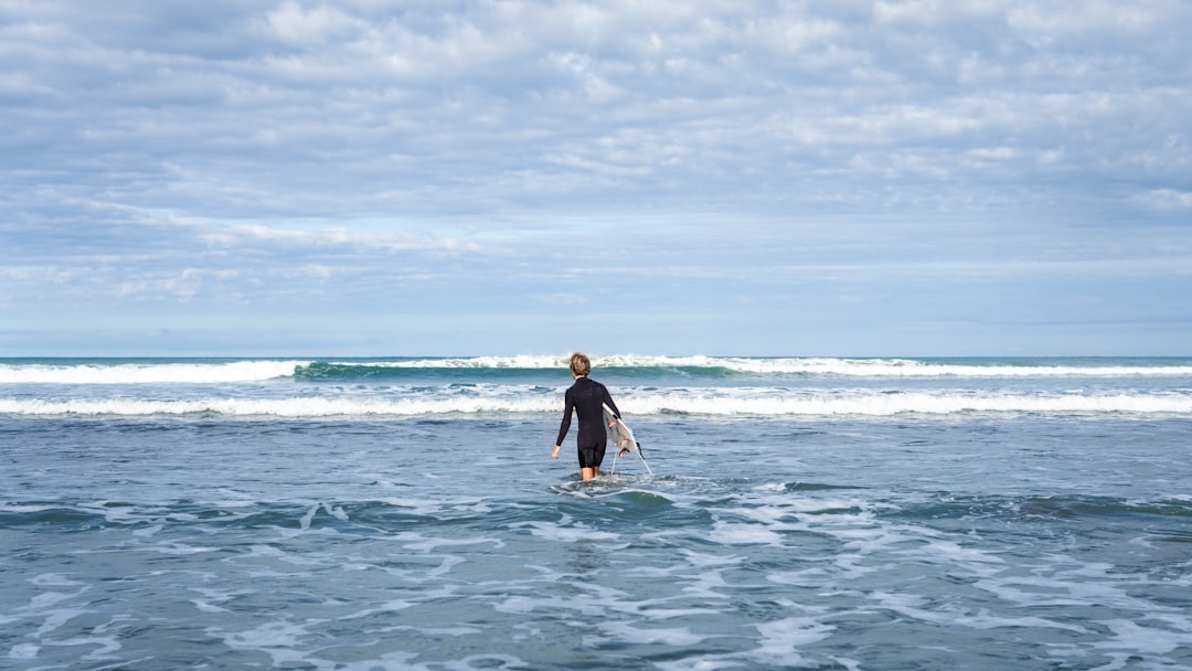 Surfing photo spot Port Waikato Muriwai Beach