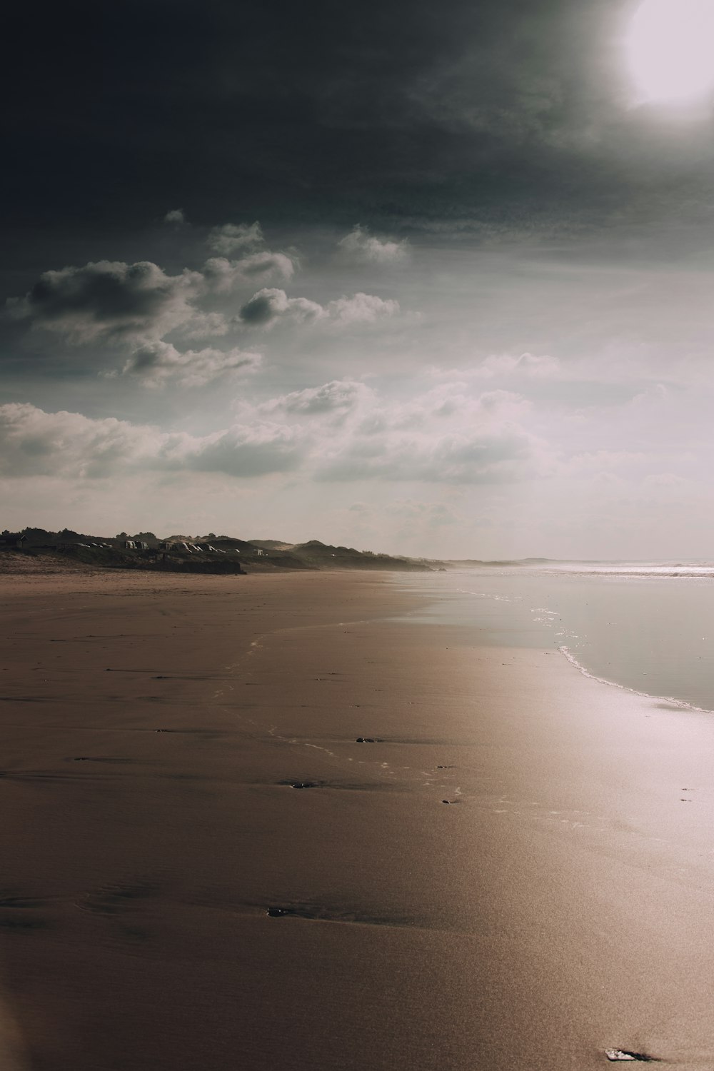 beach line under gray sky