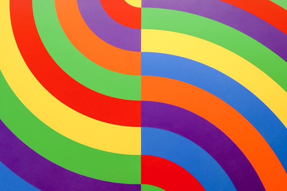 a multicolored painting of a spiral design
