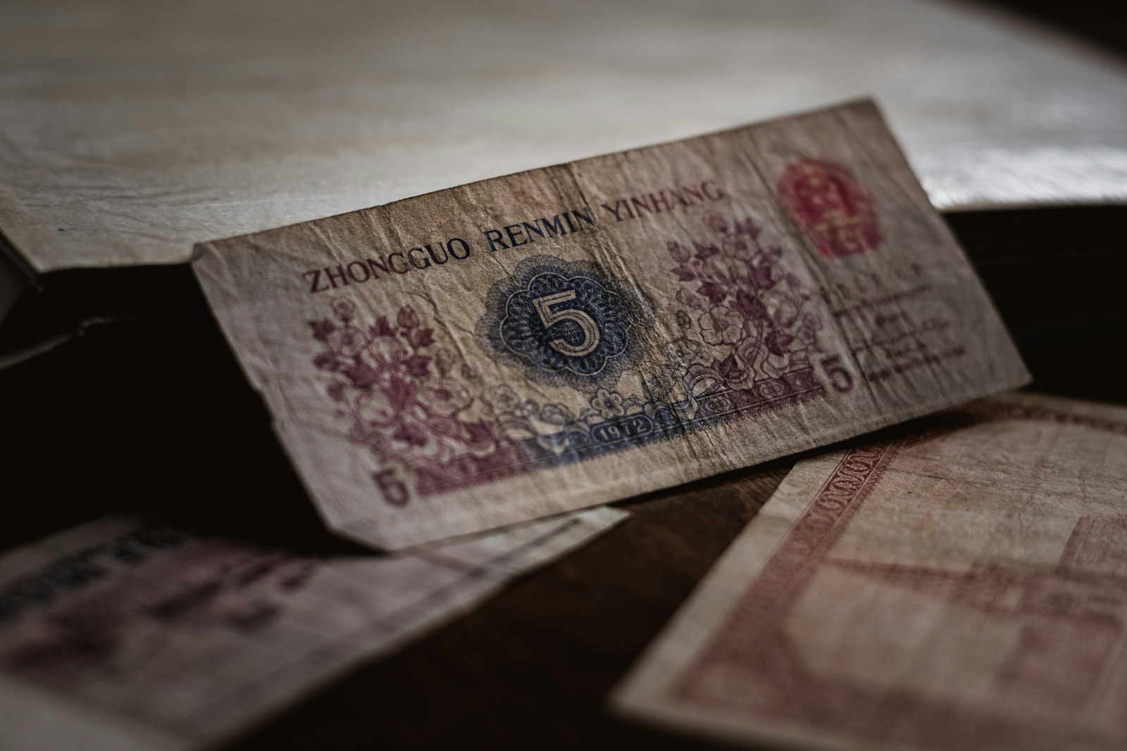 Nikon D7500 + Nikon AF-S Nikkor 50mm F1.8G sample photo. 5 banknote on brown surface photography