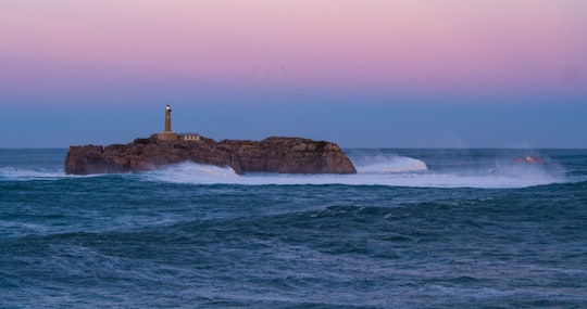 lighthouse on island in Santander Spain