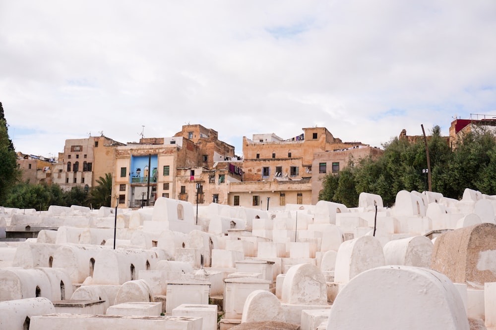 white tombstones near structure