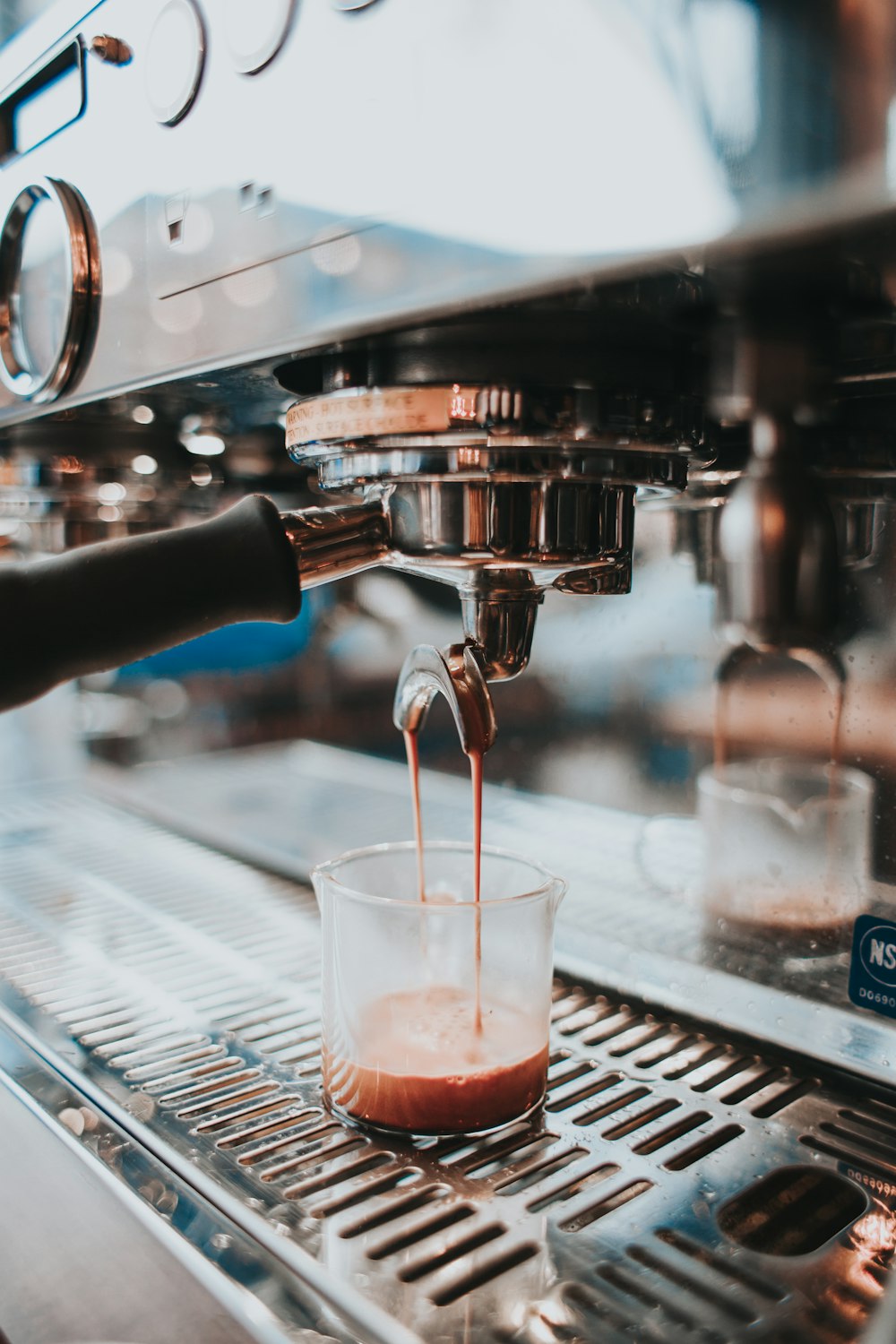 cup on espresso machine