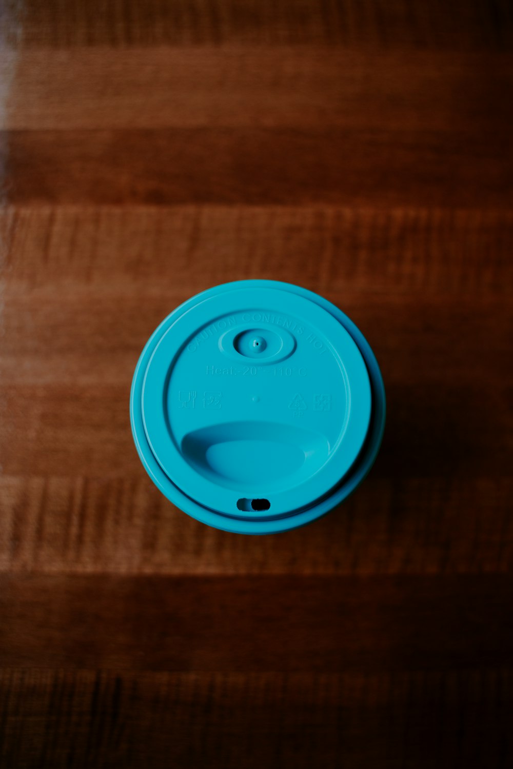 blue plastic travel mug