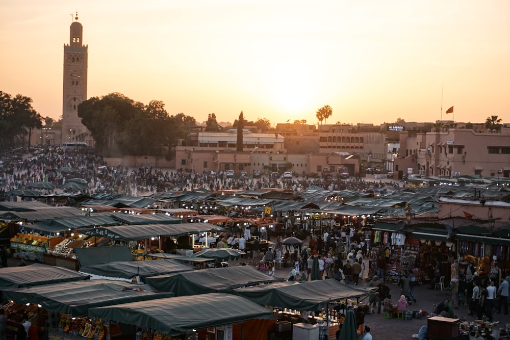 wide-angle photography of people gathering near outdoor during daytime