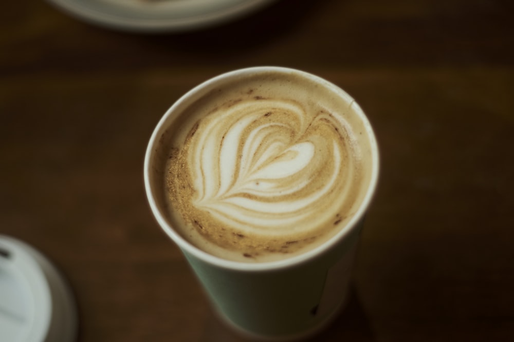 white ceramic mug with coffee