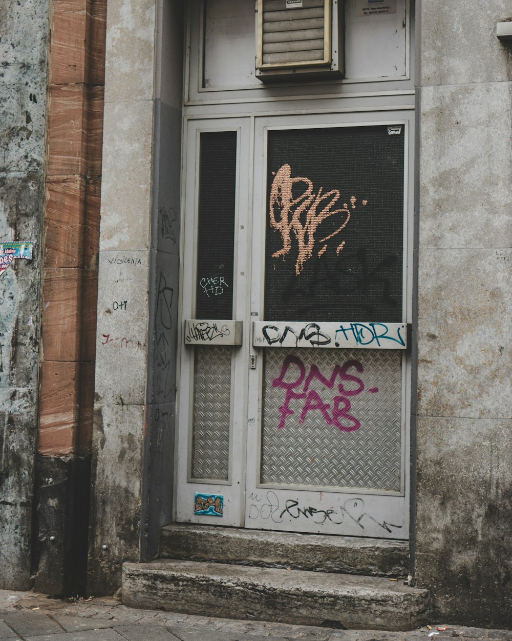 closed door building during daytime