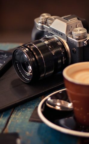 black and gray camera on table