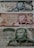 Three different Iranian banknotes featuring detailed engravings of a man's portrait dressed in military attire. The notes are adorned with intricate floral and scrollwork patterns, accompanied by Persian script.