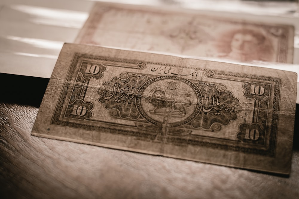 10 banknote on white surface