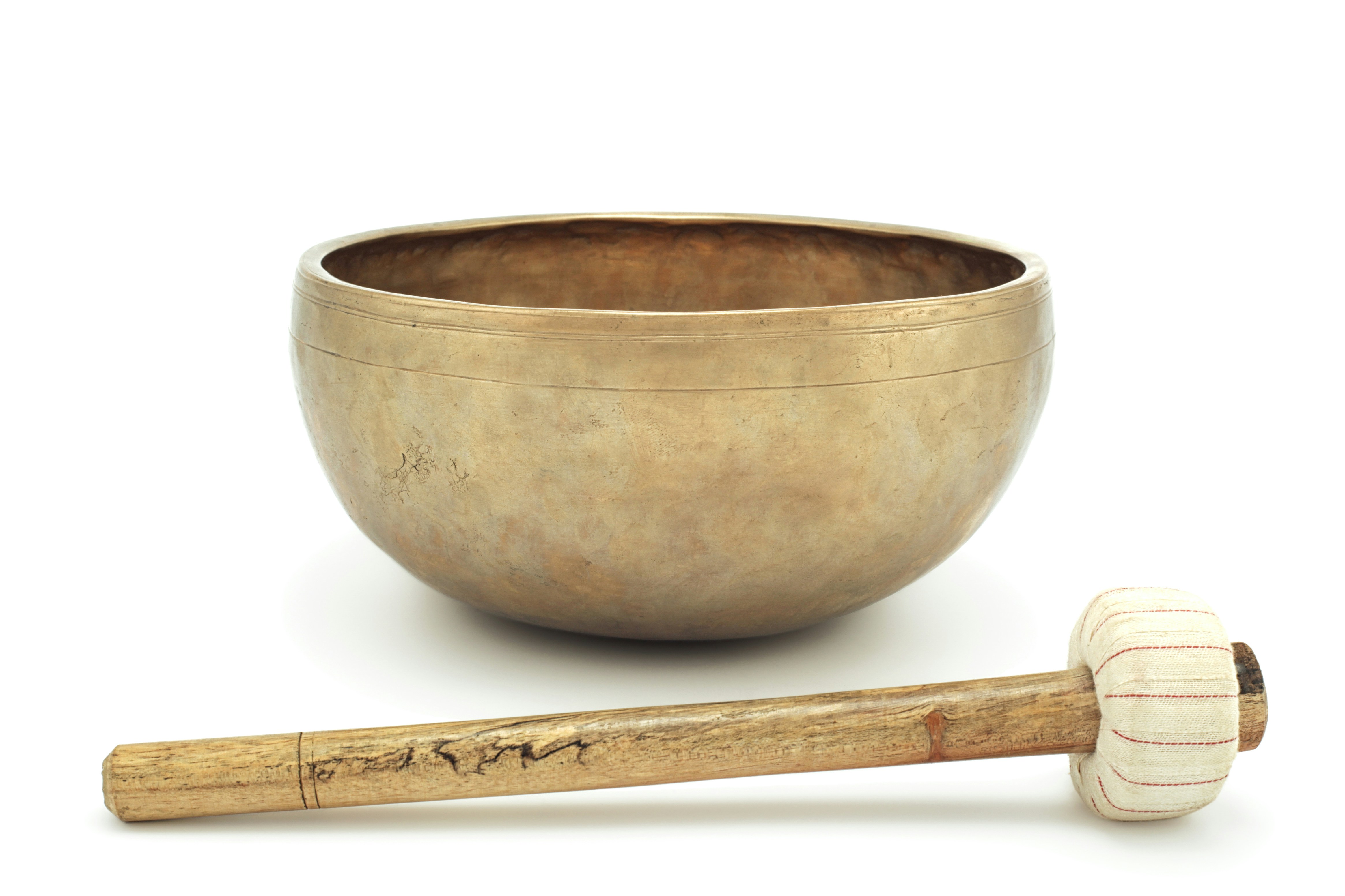 Antique singing bowl  with a mallet. Singing bowls meditation