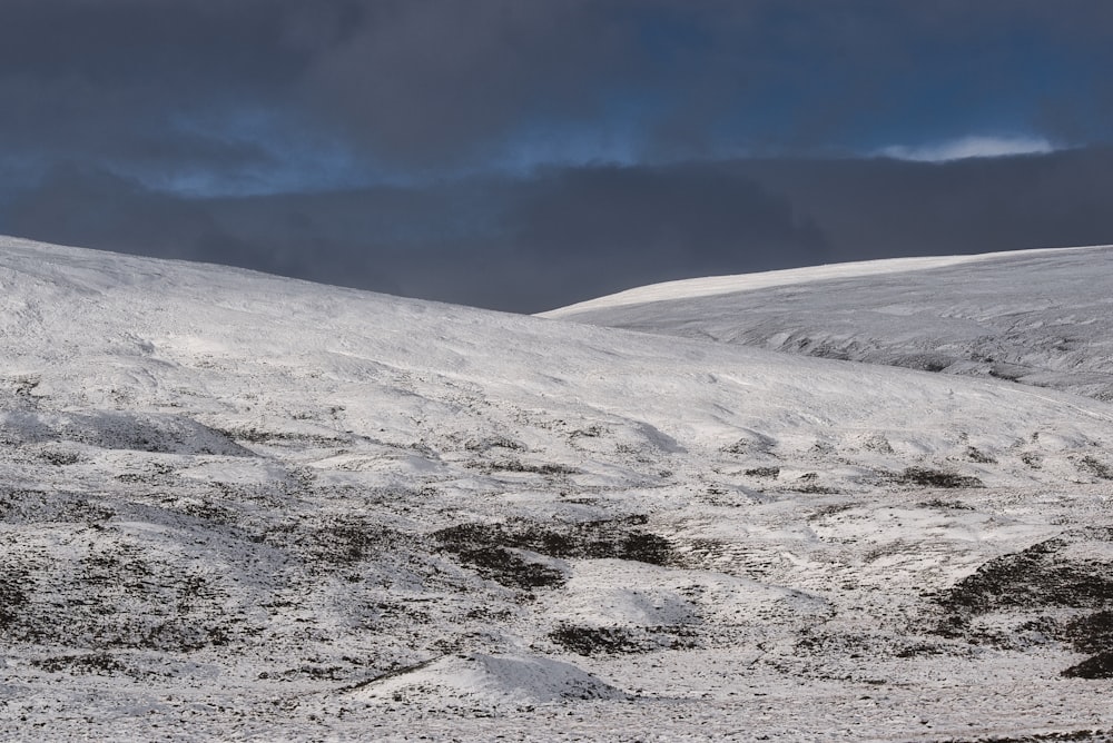 gray and white mountains under blue sky during daytime