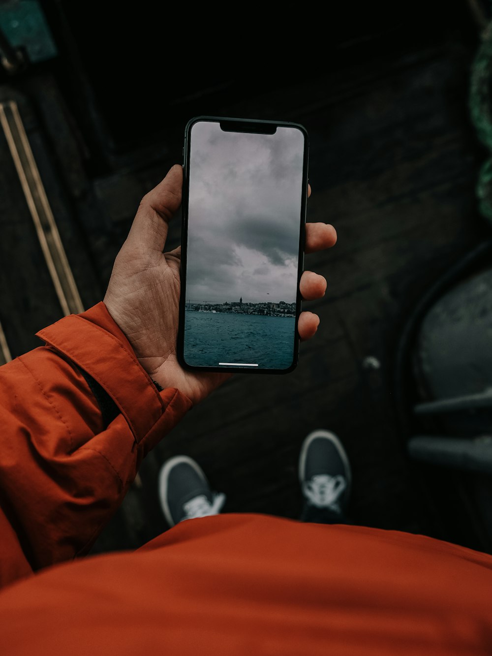 person holding black smartphone