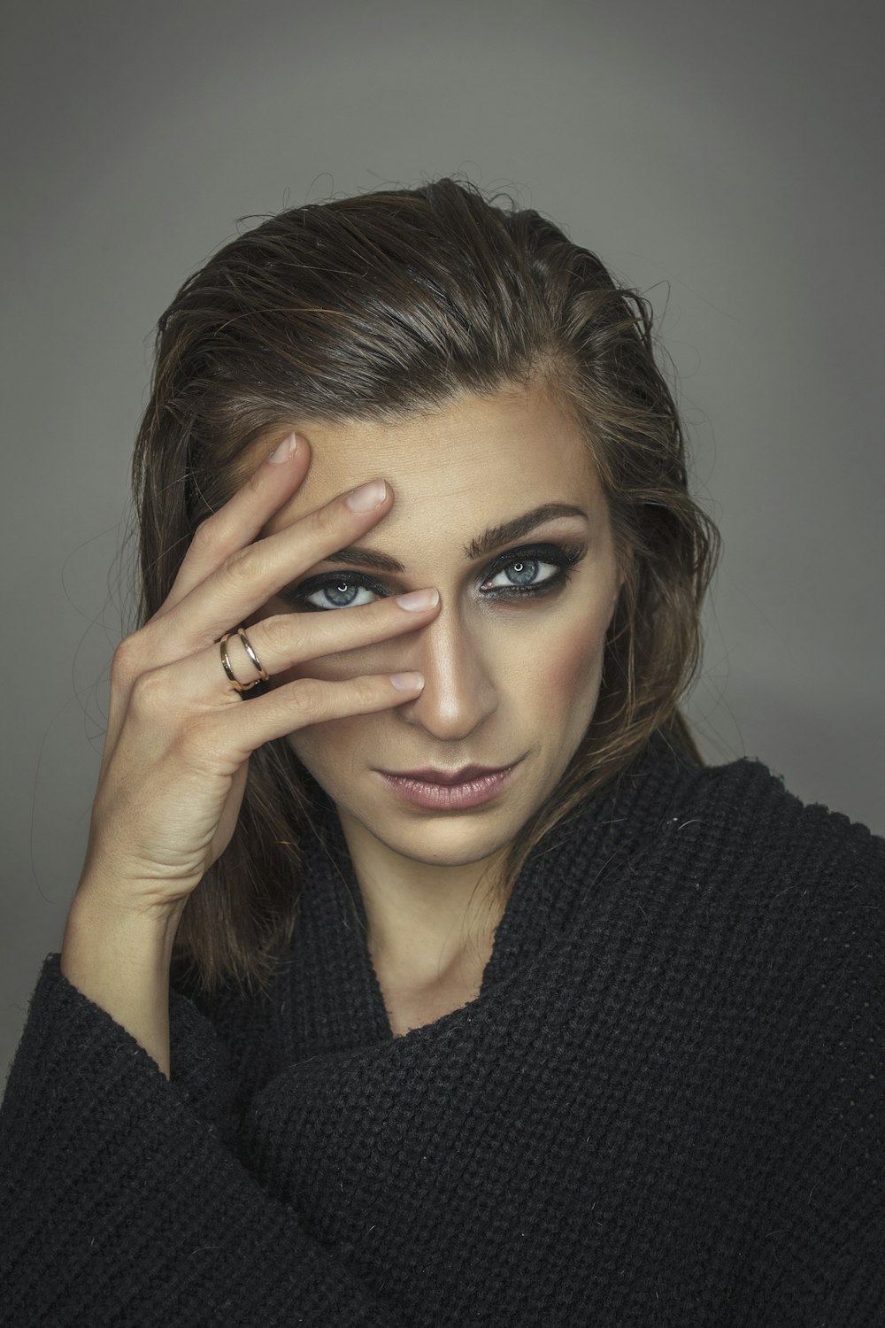 woman wearing black sweater