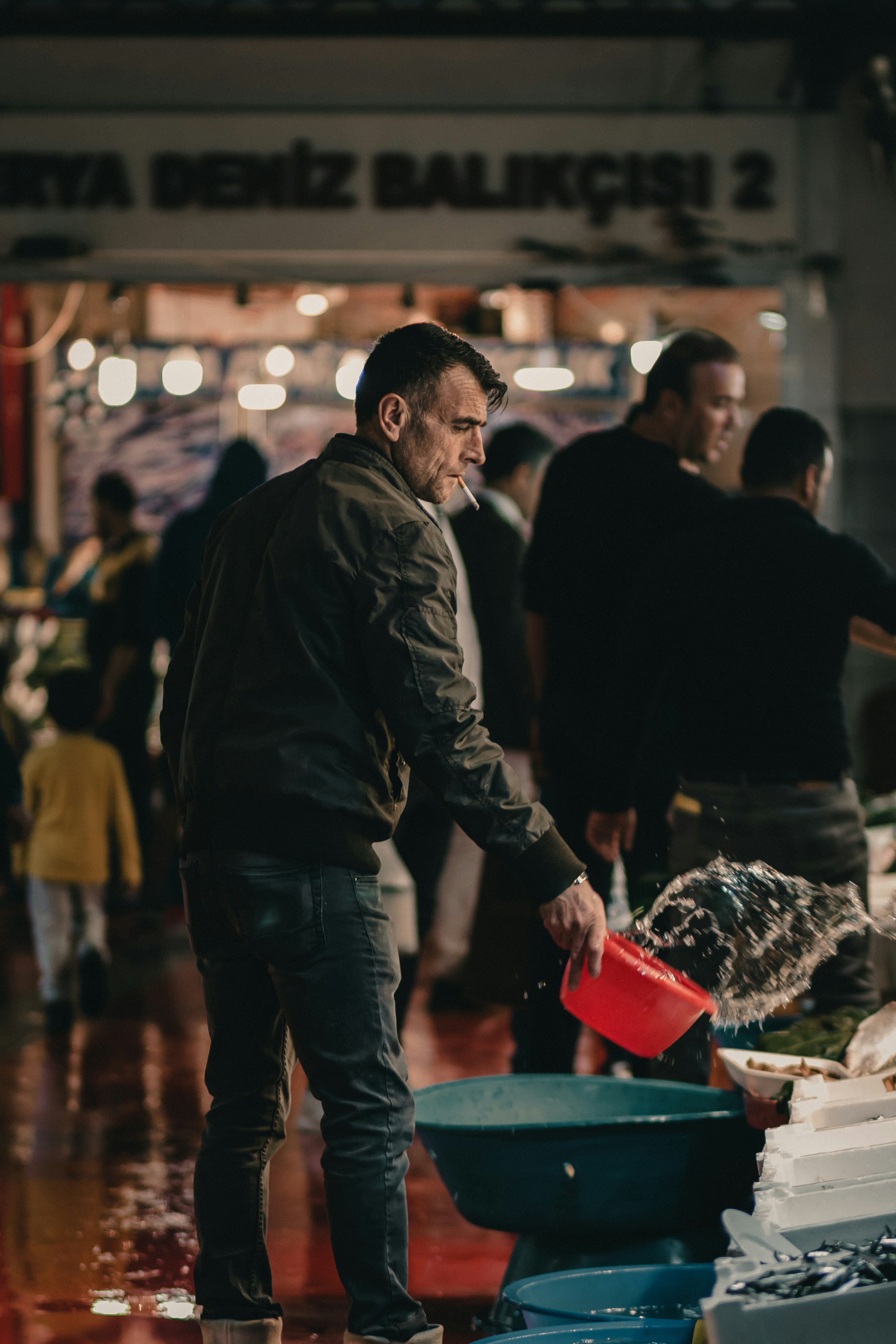 man holding dip bucket