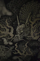 black and beige dragon-printed textile