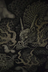 black and beige dragon-printed textile