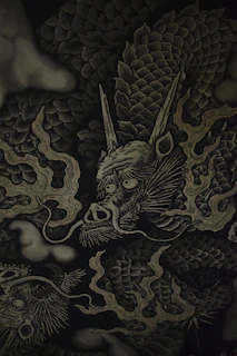 black and beige dragon-printed textile