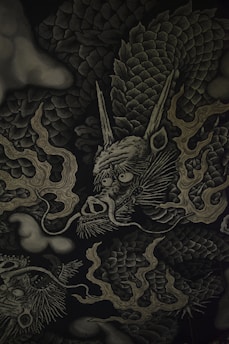 black and beige dragon-printed textile