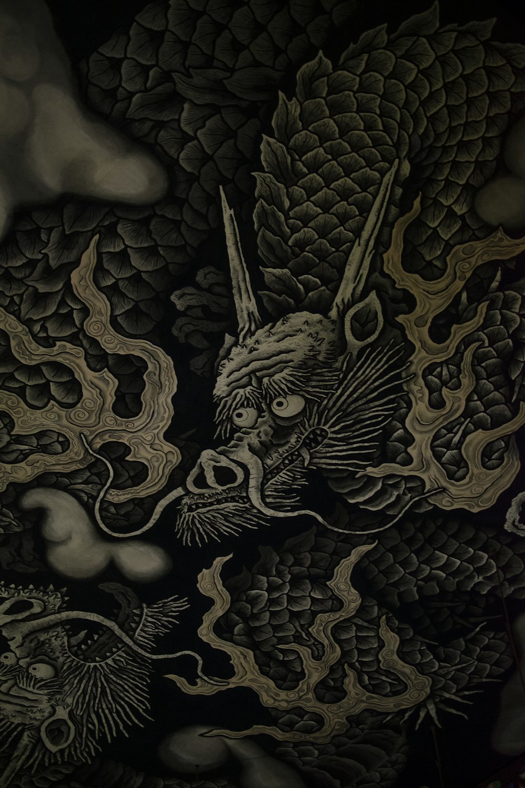 black and beige dragon-printed textile