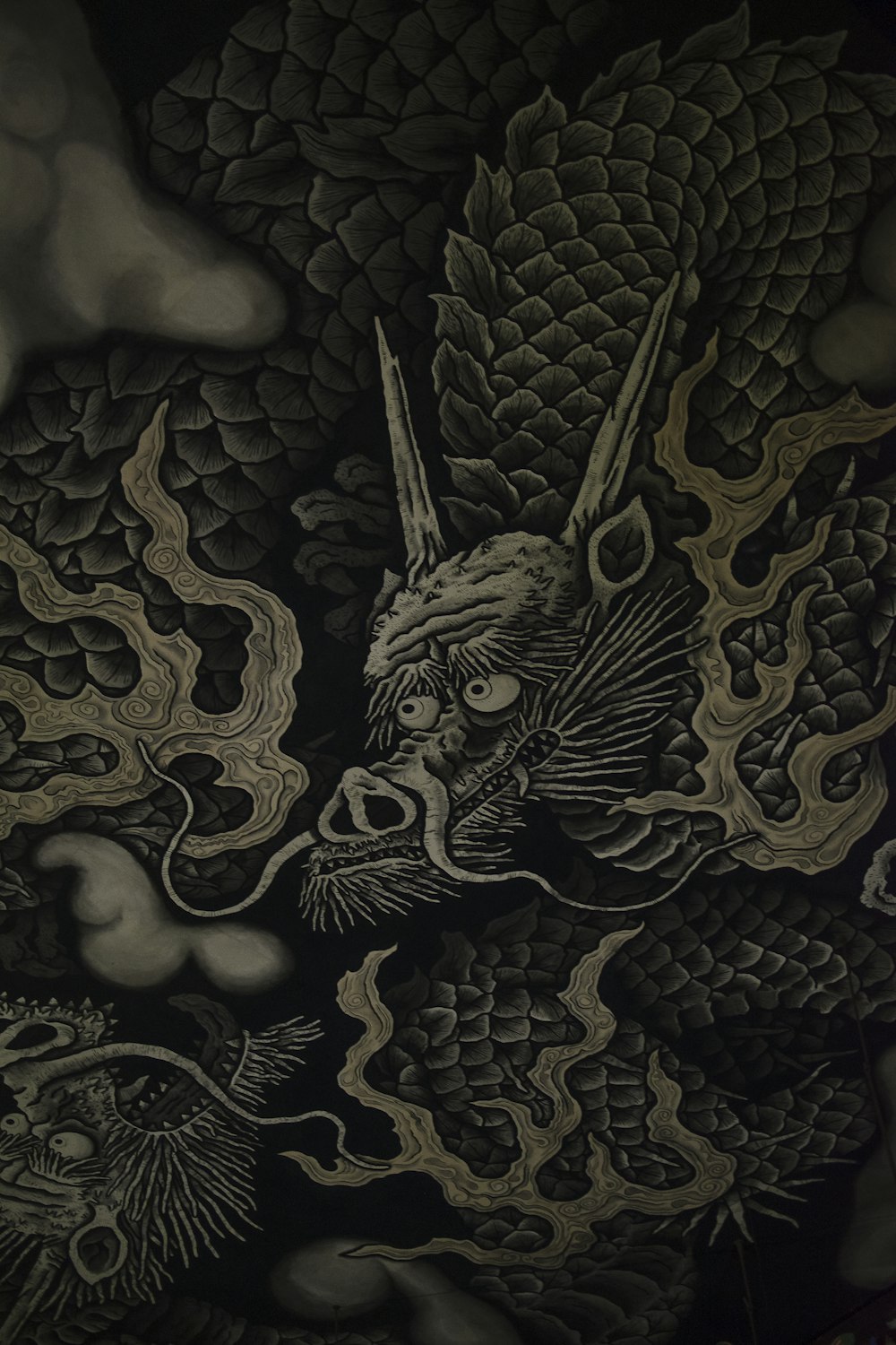 black and beige dragon-printed textile