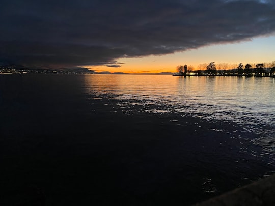body of water during sunset in Lausanne Switzerland