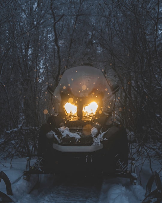 black vehicle on snow in Yellowknife Canada