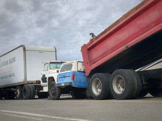 A fleet of delivery trucks lined up, ready to bring fuel to customers.