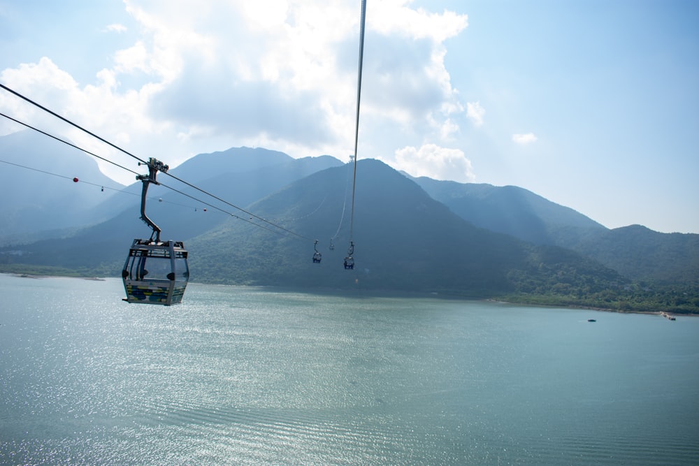 black cable car over the sea