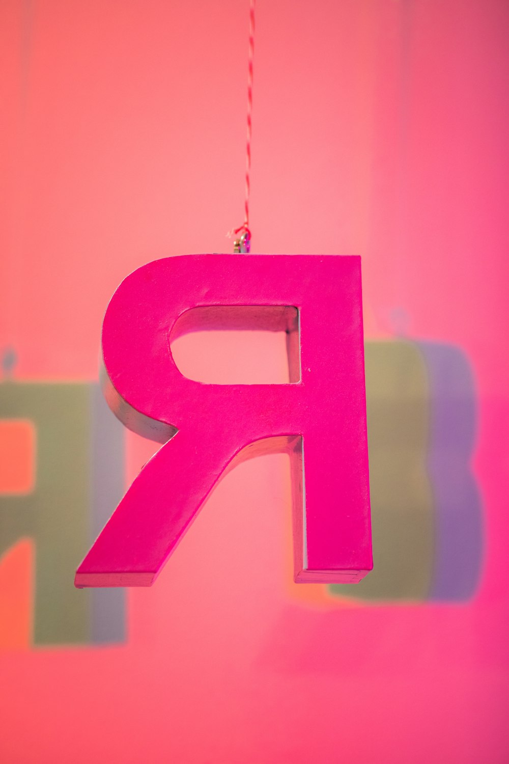 pink R freestanding letter