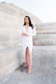 woman standing beside wall