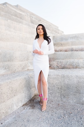 woman standing beside wall
