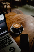coffee in black ceramic teacup