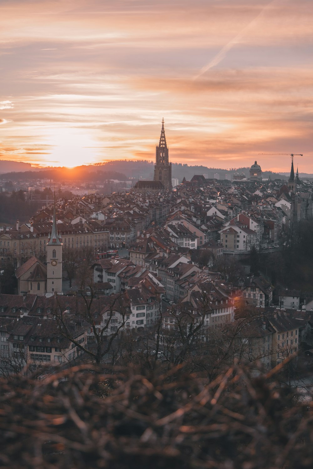 city skyline during sunset with orange sky