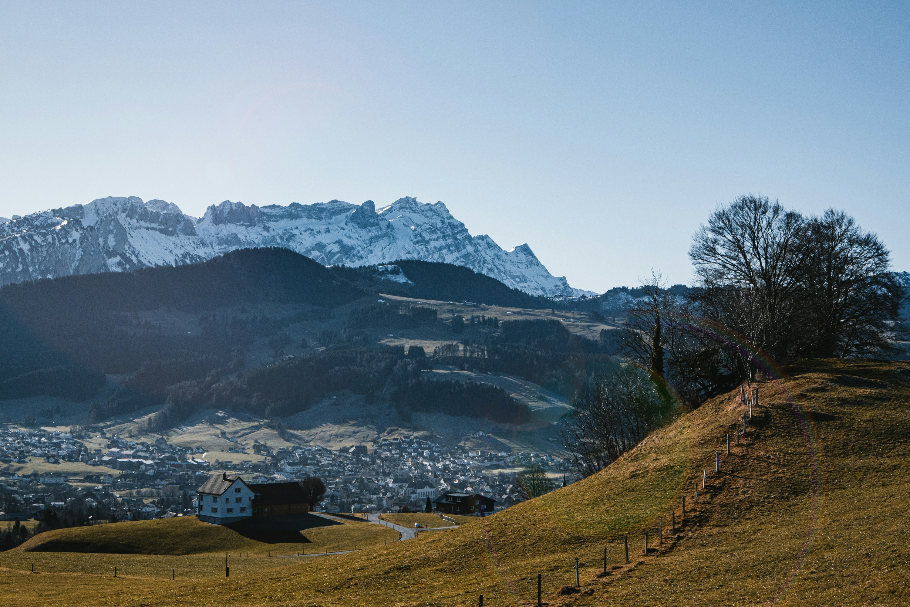Alpine meadows with traditional wooden houses in Appenzell - best off the beaten path european destinations