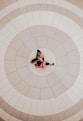 a small child is sitting on the floor