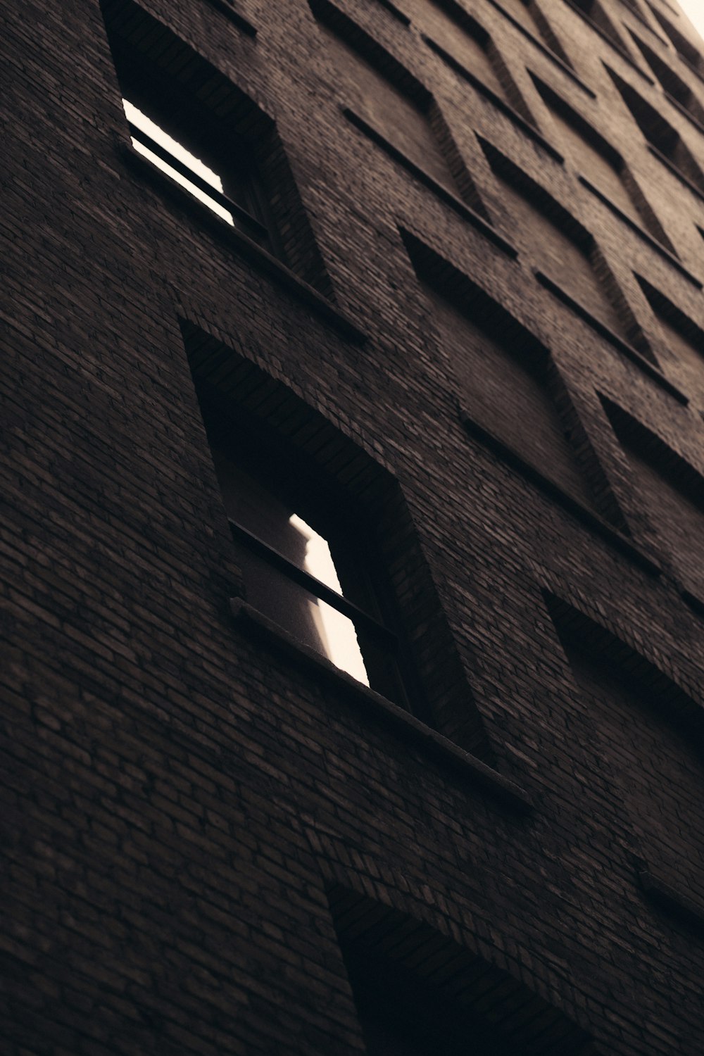 a black and white photo of a tall building