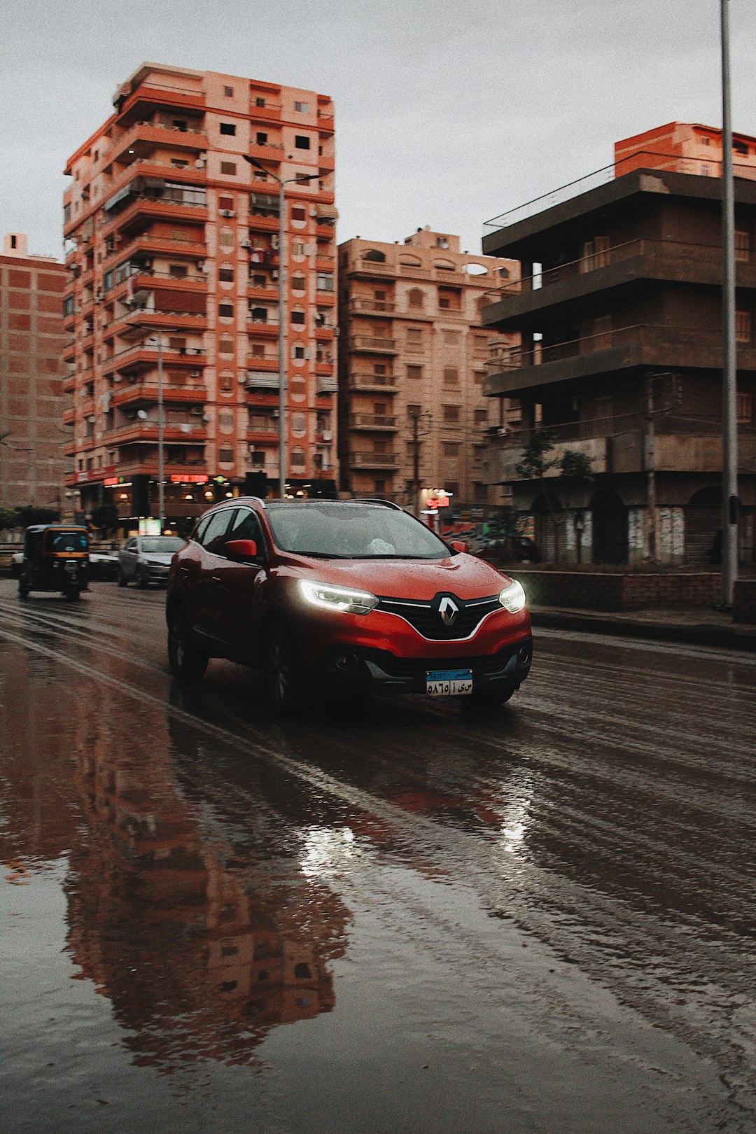 black sedan on road during daytime