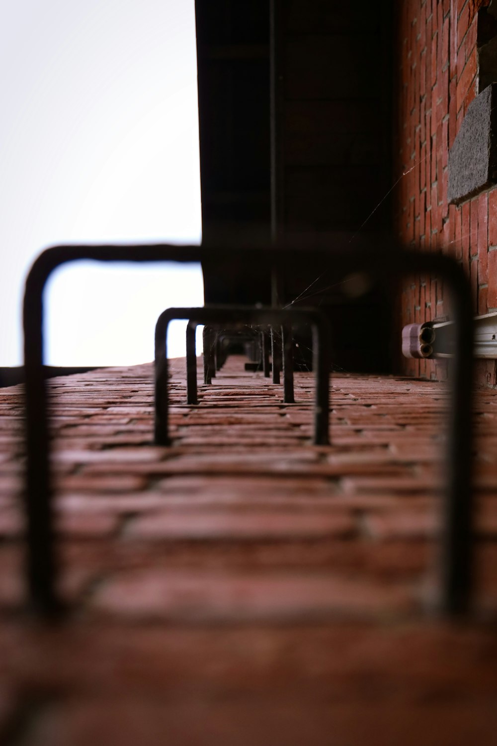 black metal ladder on wooden floor