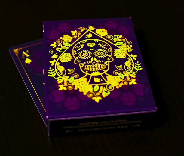A vibrant spread of custom Juneteenth playing cards featuring detailed portraits and colorful designs.