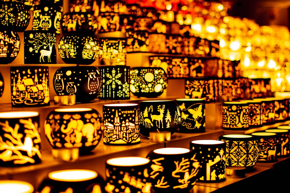 a room filled with lots of lit candles