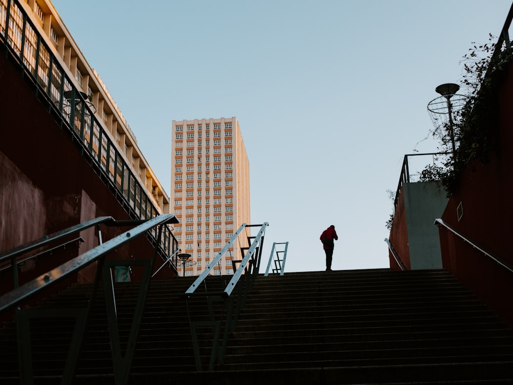 a person walking up a flight of stairs