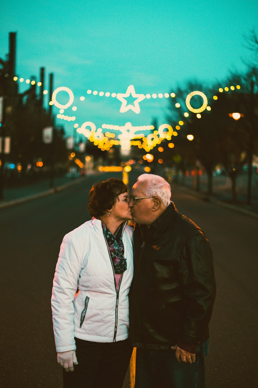 a man and a woman standing next to each other