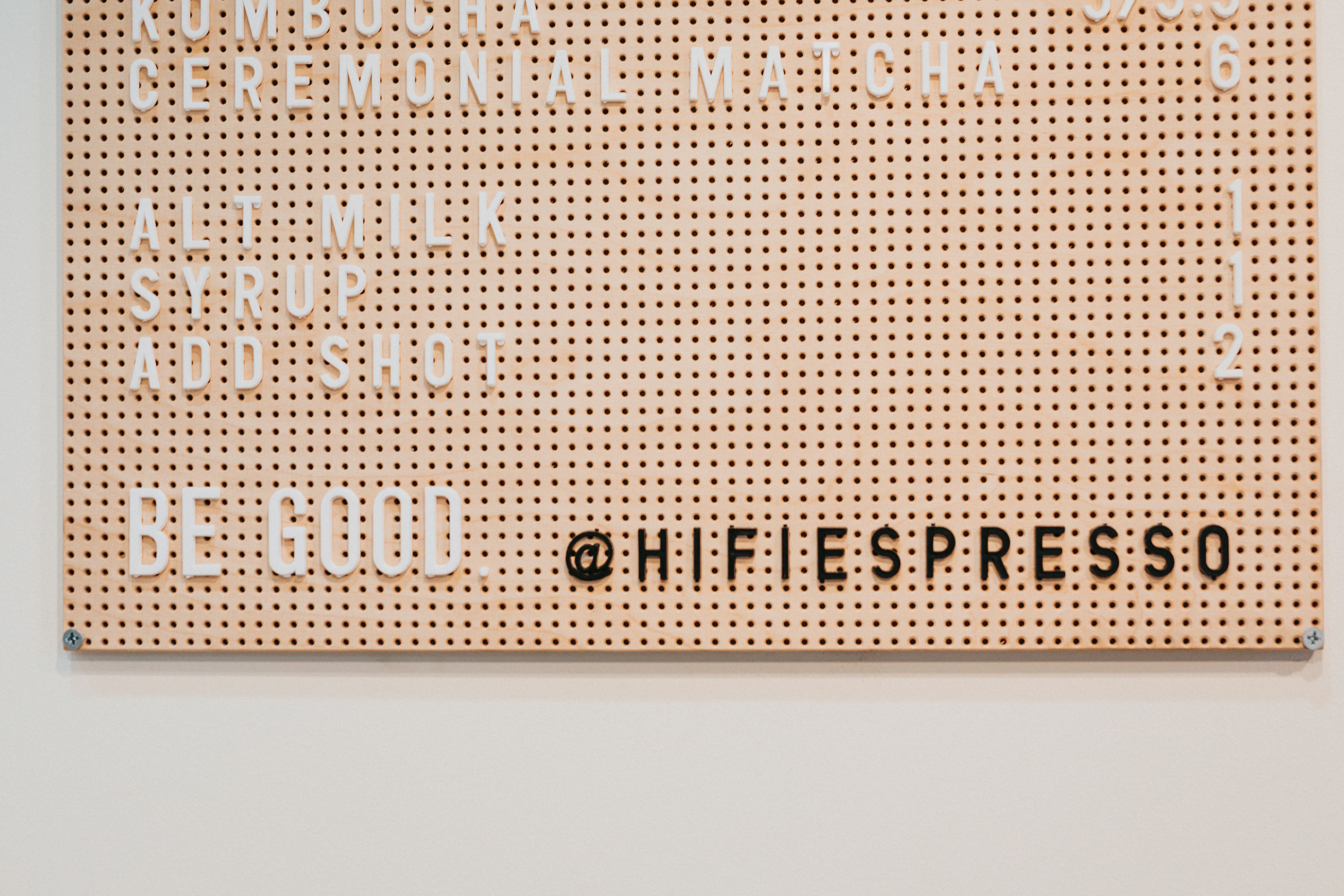 a sign that is hanging on a wall