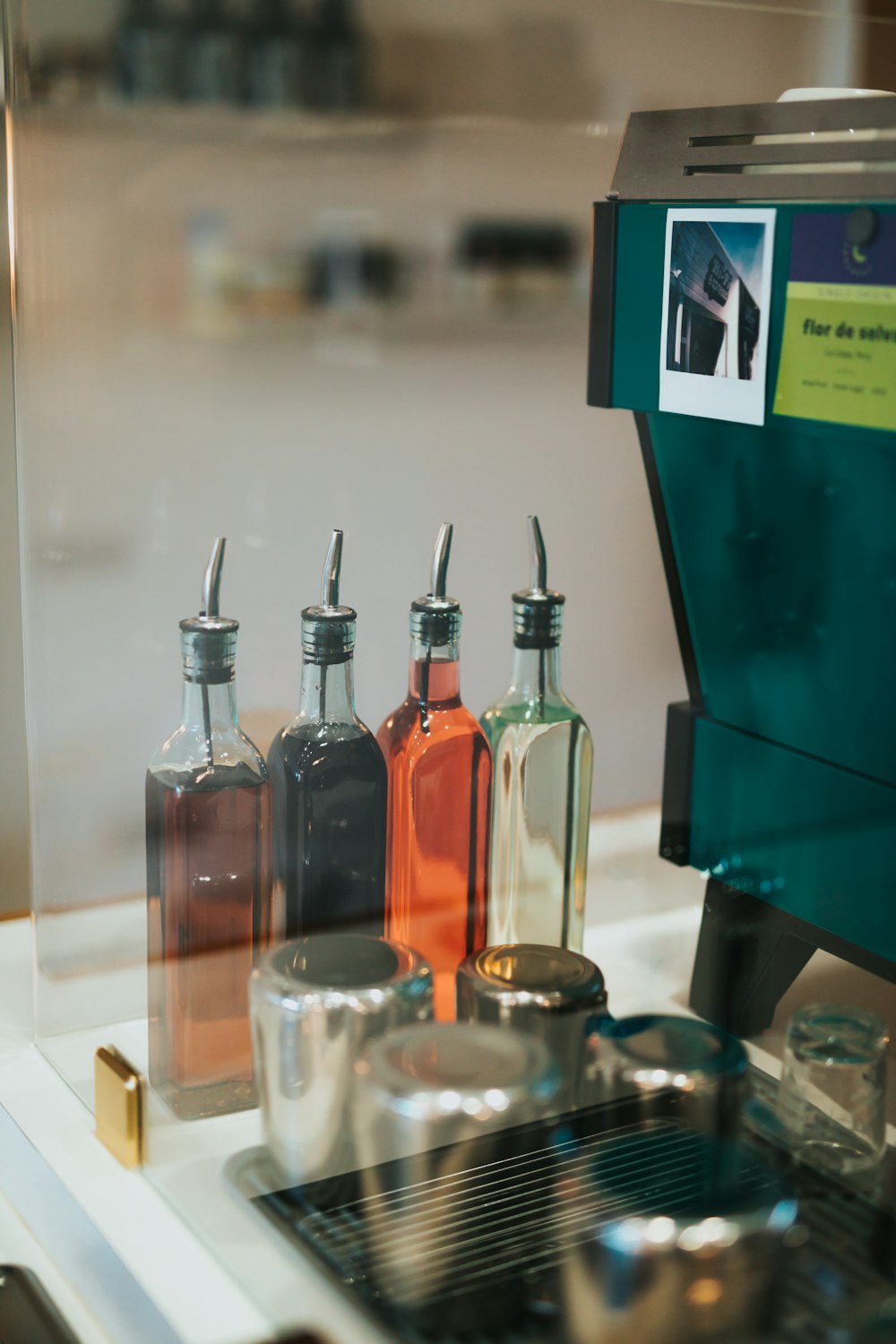 bottles of alcohol are lined up on a counter