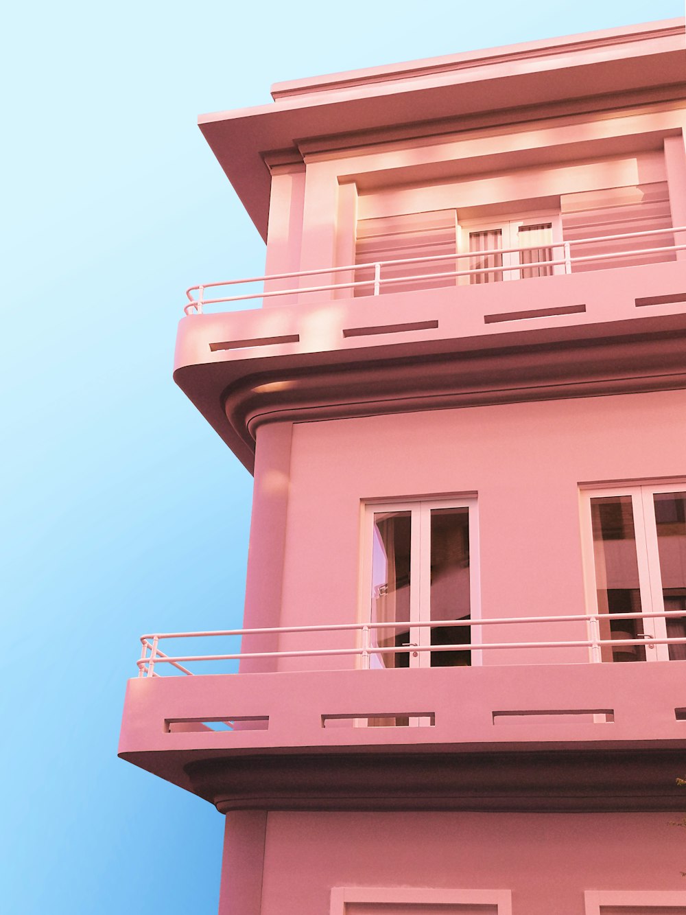 pink and white concrete building