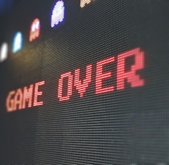 device screen with text "Game Over"