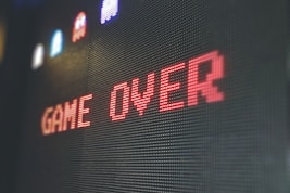 device screen with text "Game Over"