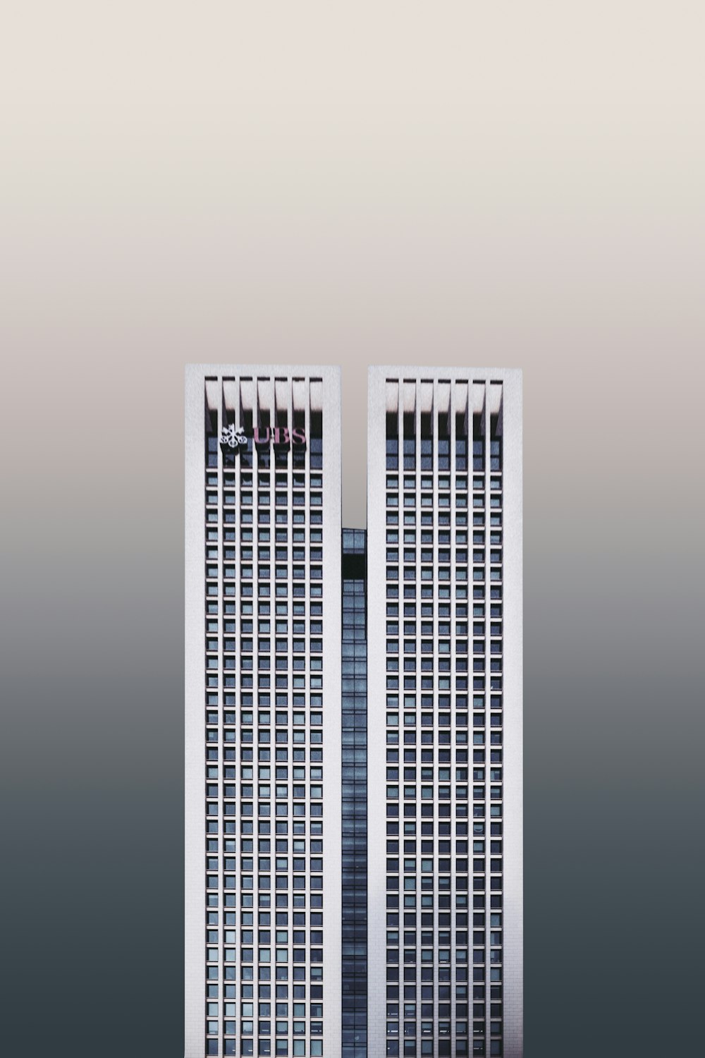 a tall building with two tall windows on top of it