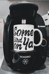 Bosch coffee machine technician testing functionality after service.